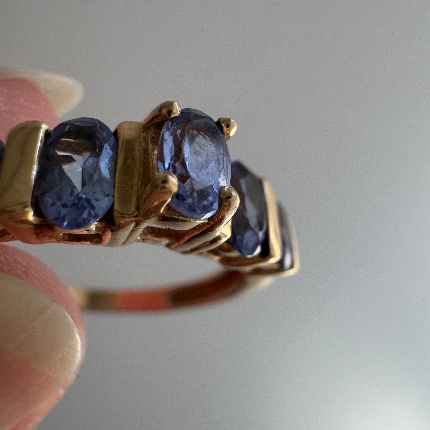 V I N T A G E // periwinkle row / 10k yellow gold and tanzanite half eternity band / size 8
