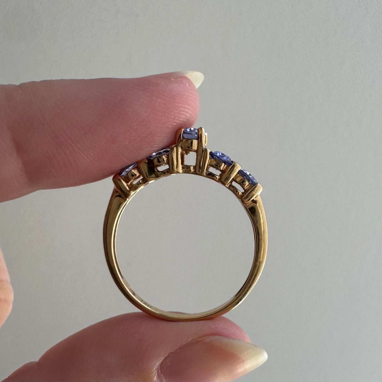 V I N T A G E // periwinkle row / 10k yellow gold and tanzanite half eternity band / size 8