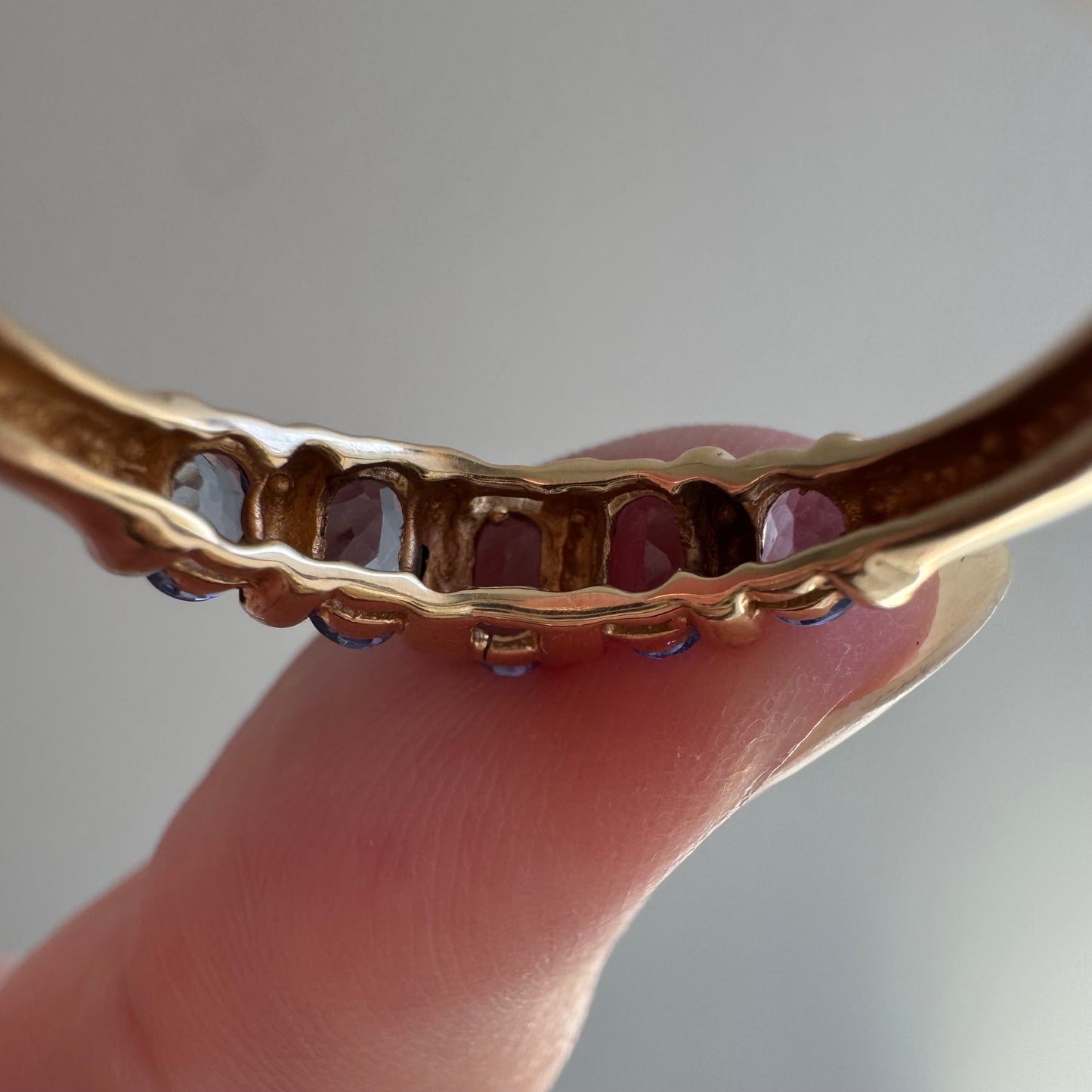 V I N T A G E // periwinkle row / 10k yellow gold and tanzanite half eternity band / size 8