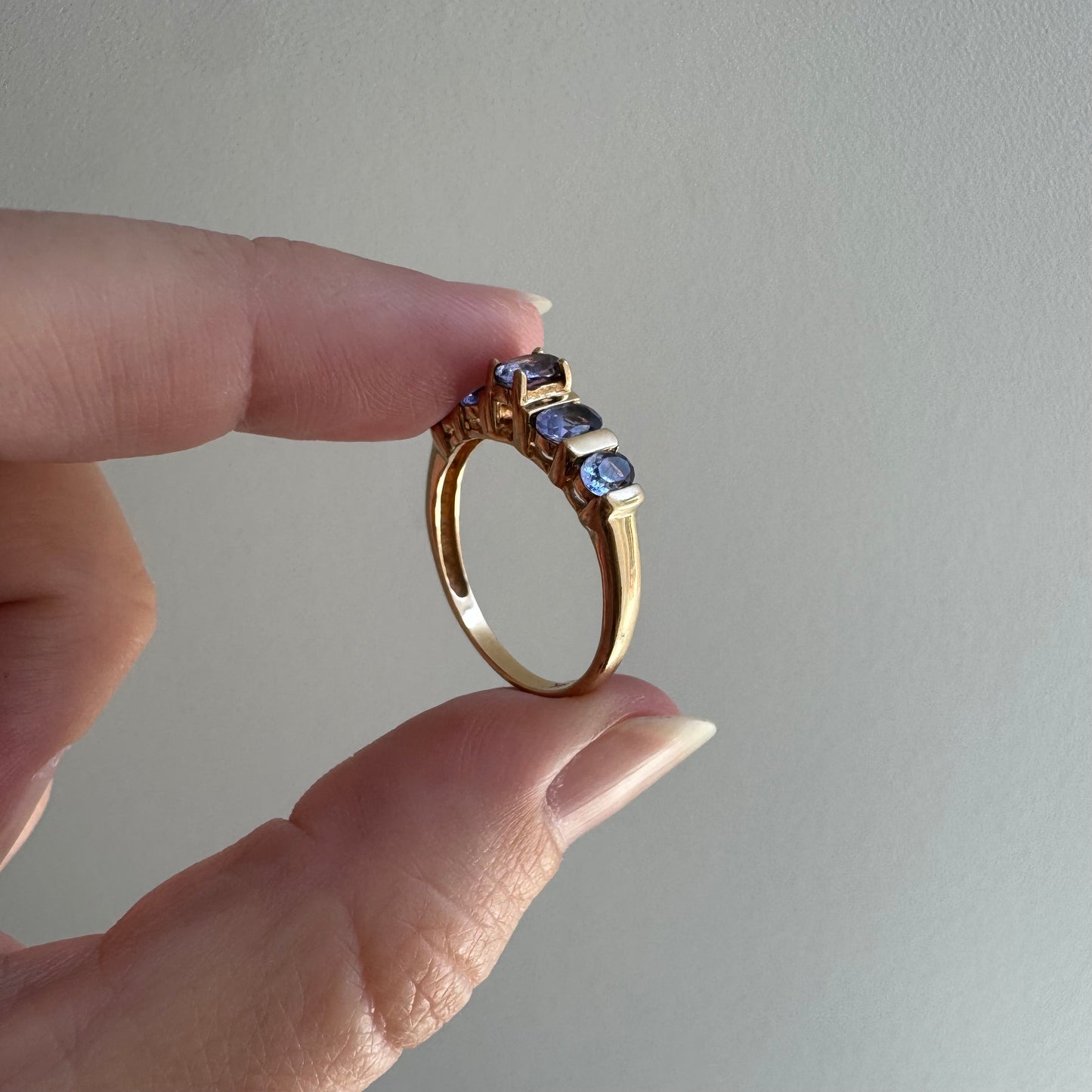 V I N T A G E // periwinkle row / 10k yellow gold and tanzanite half eternity band / size 8