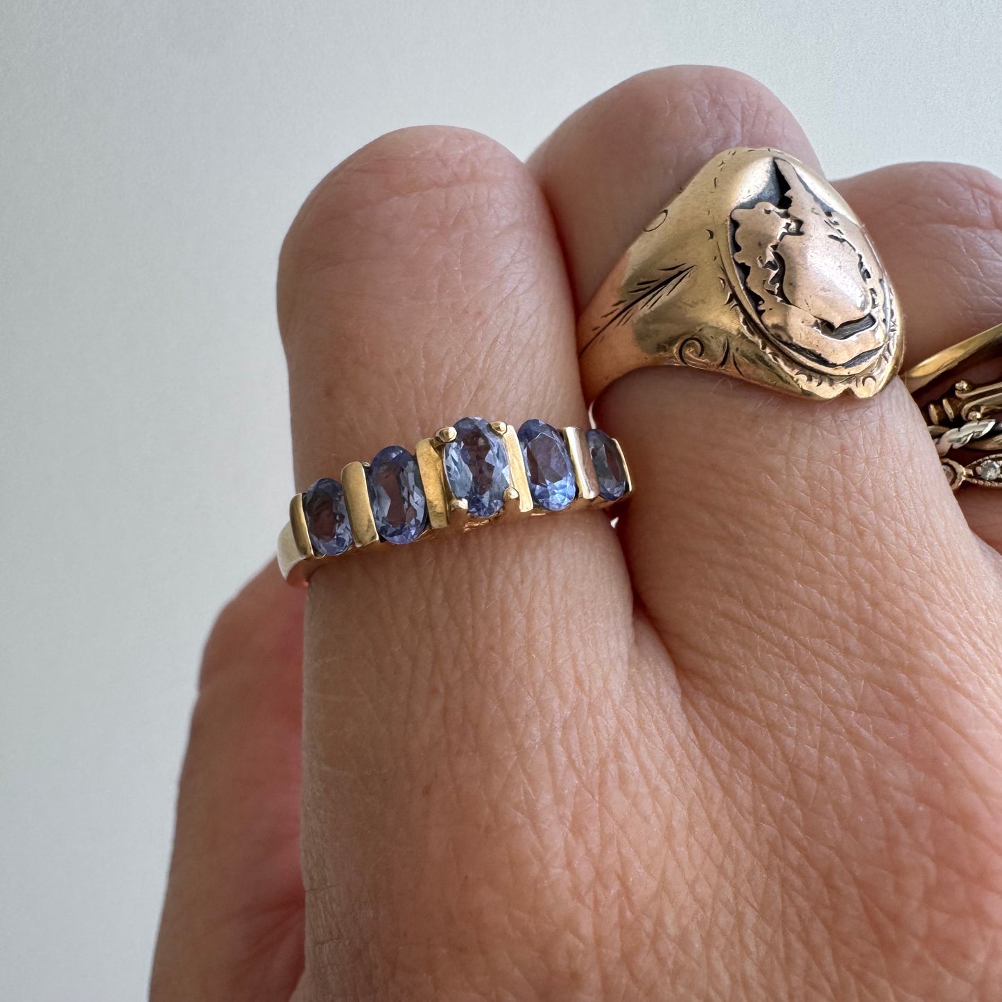 V I N T A G E // periwinkle row / 10k yellow gold and tanzanite half eternity band / size 8