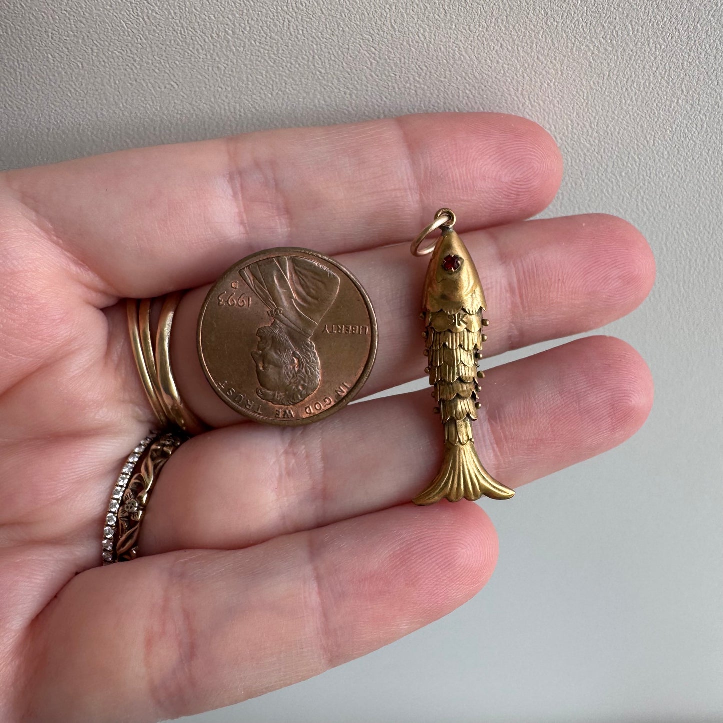 V I N T A G E // a lucky catch / 9k yellow gold and red glass articulated wiggle fish / a pendant