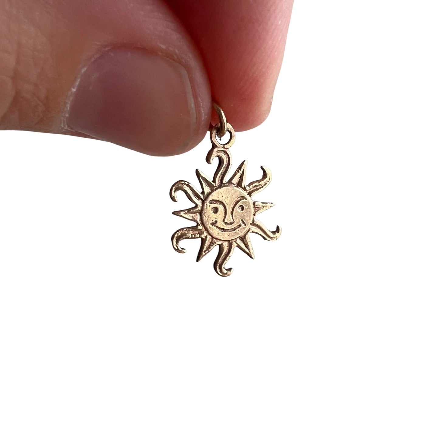 V I N T A G E // flares of mischief / 14k yellow gold sun face charm