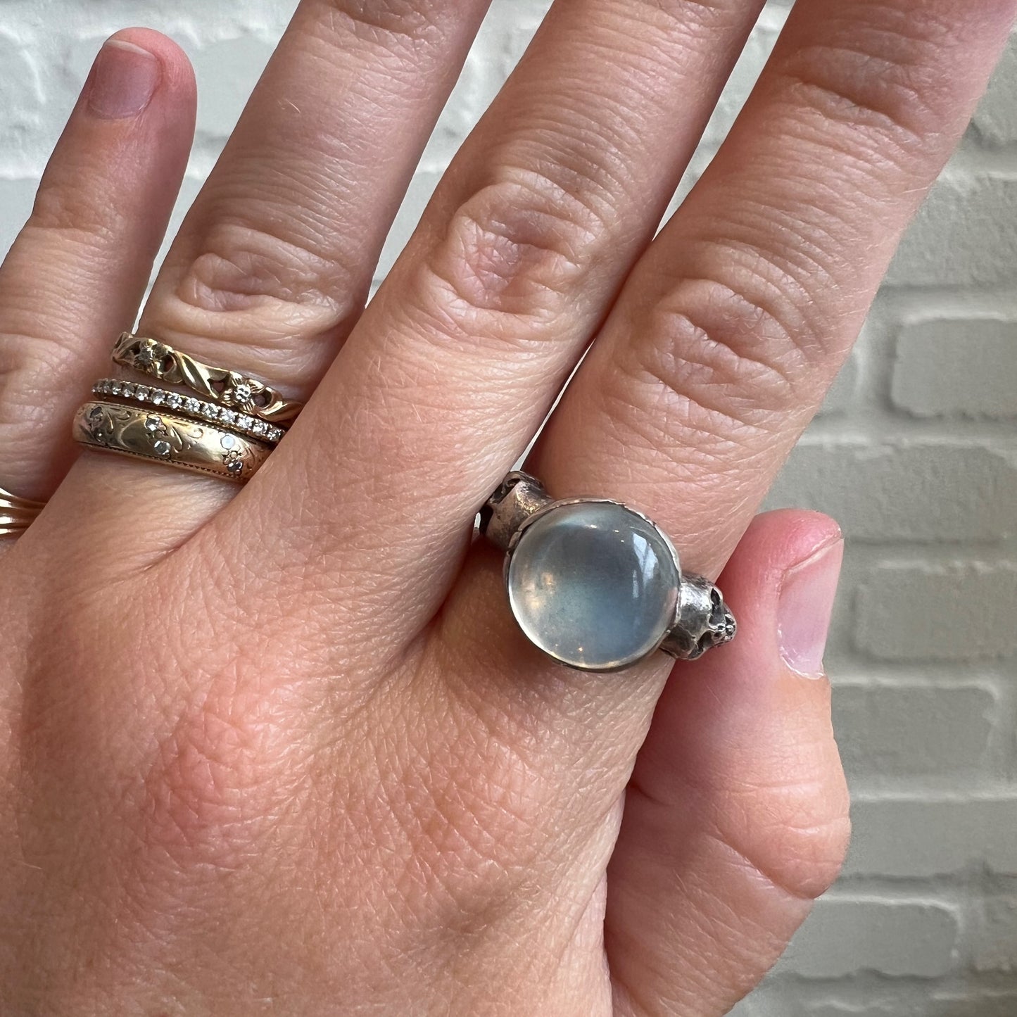 V I N T A G E // spooky sides of the moon / sterling silver memento mori ring / moonstone glass and garnets / size 7