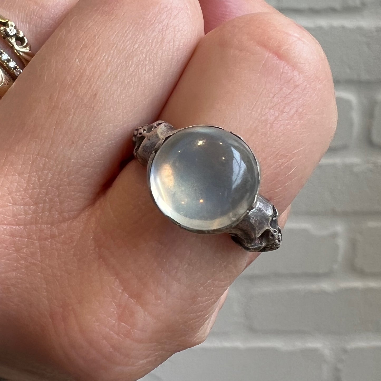 V I N T A G E // spooky sides of the moon / sterling silver memento mori ring / moonstone glass and garnets / size 7