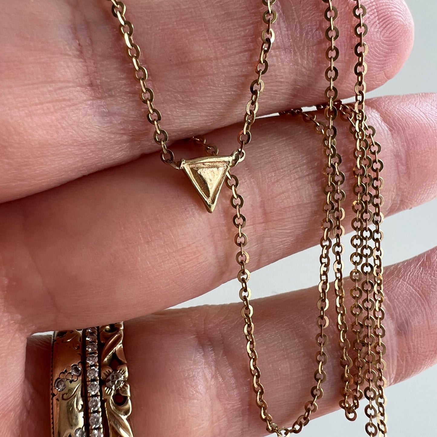 H A N D M A D E // tiny change / 14k yellow gold triangle pendant necklace / 17"