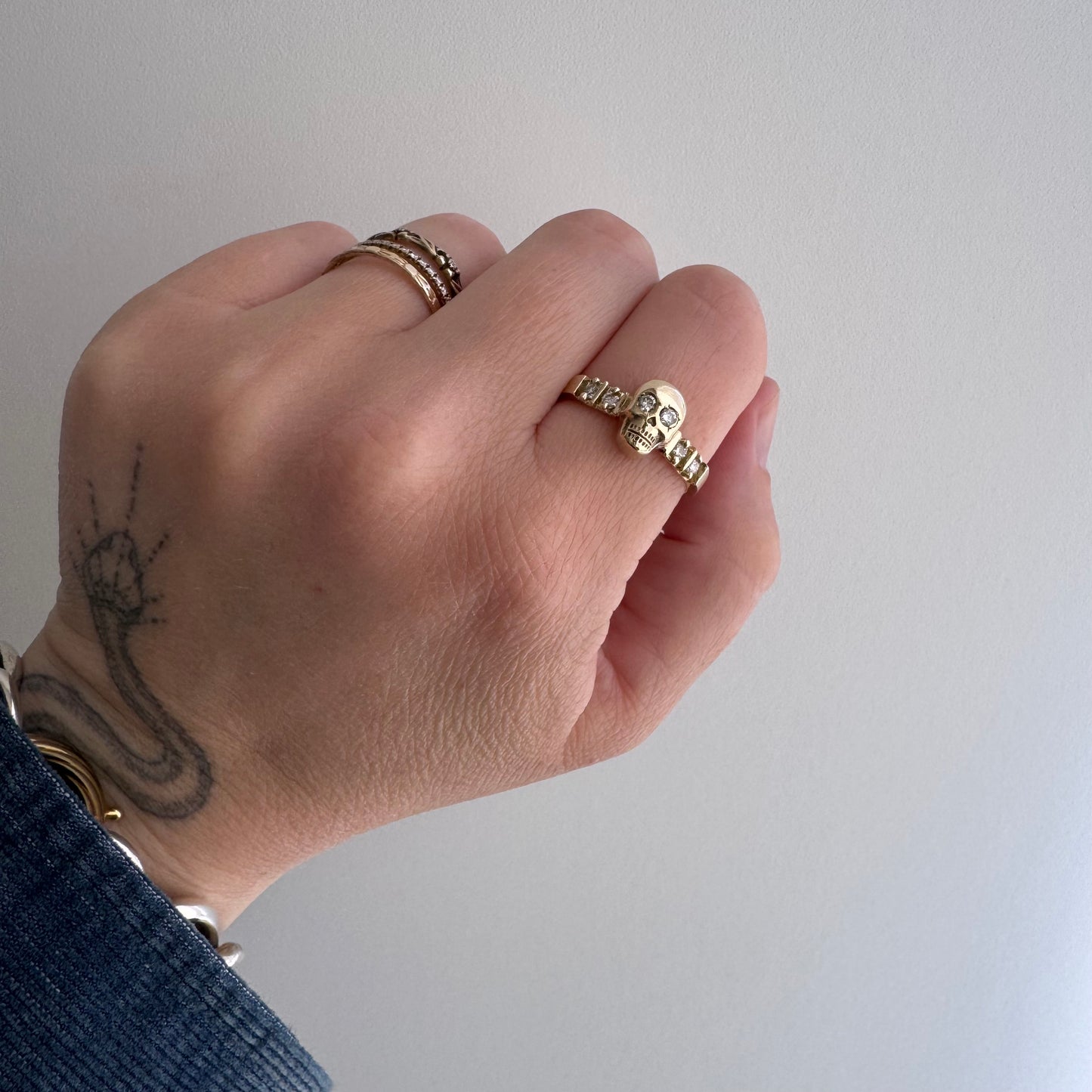 reimagined E S T A T E // memento mori / 14k and diamond half eternity skull stacking ring / size 8.25+