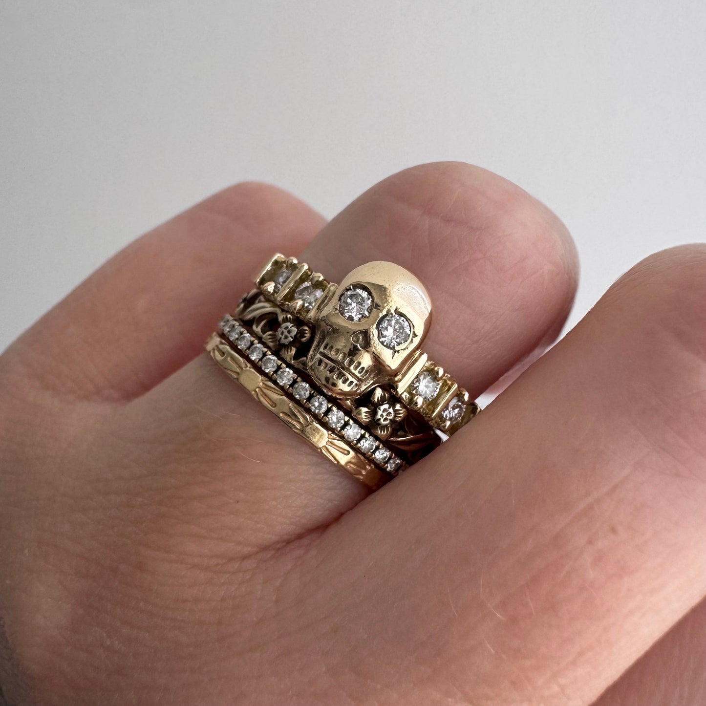 reimagined E S T A T E // memento mori / 14k and diamond half eternity skull stacking ring / size 8.25+