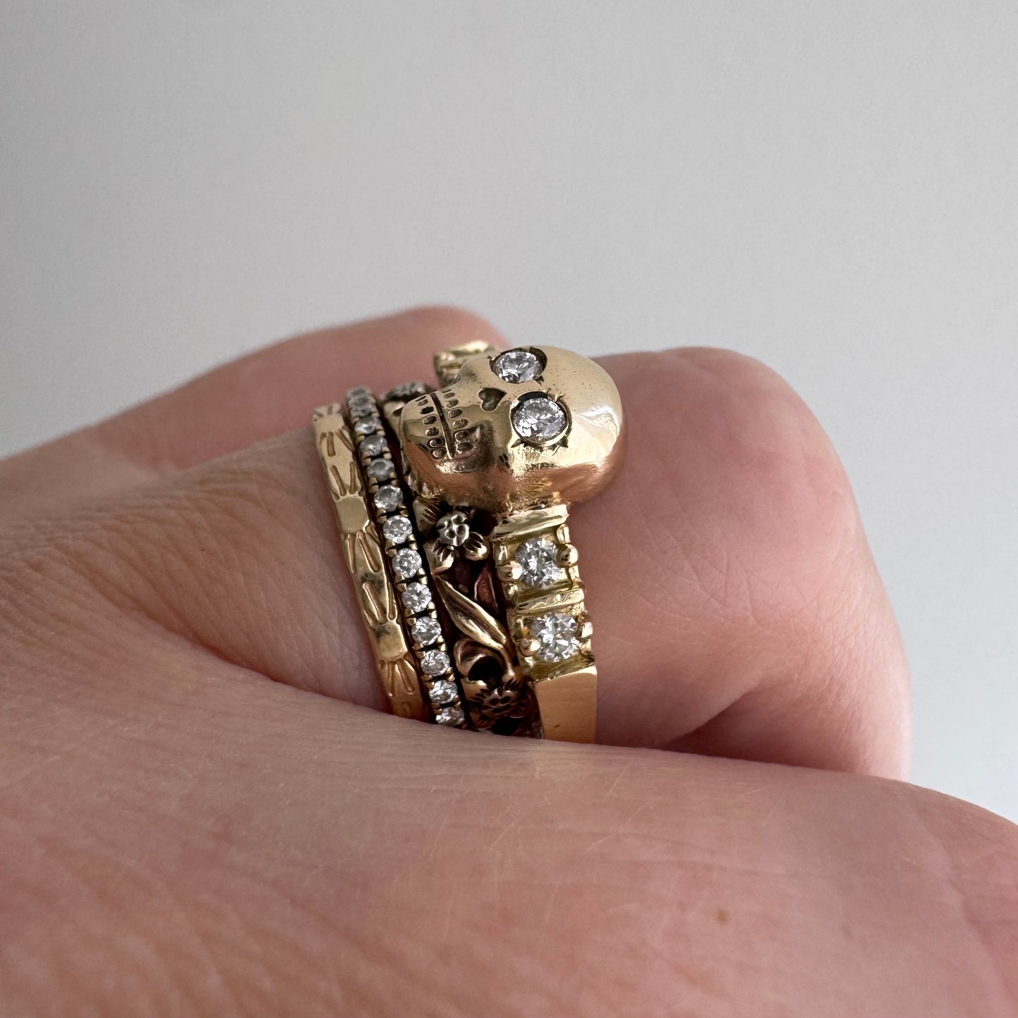 reimagined E S T A T E // memento mori / 14k and diamond half eternity skull stacking ring / size 8.25+