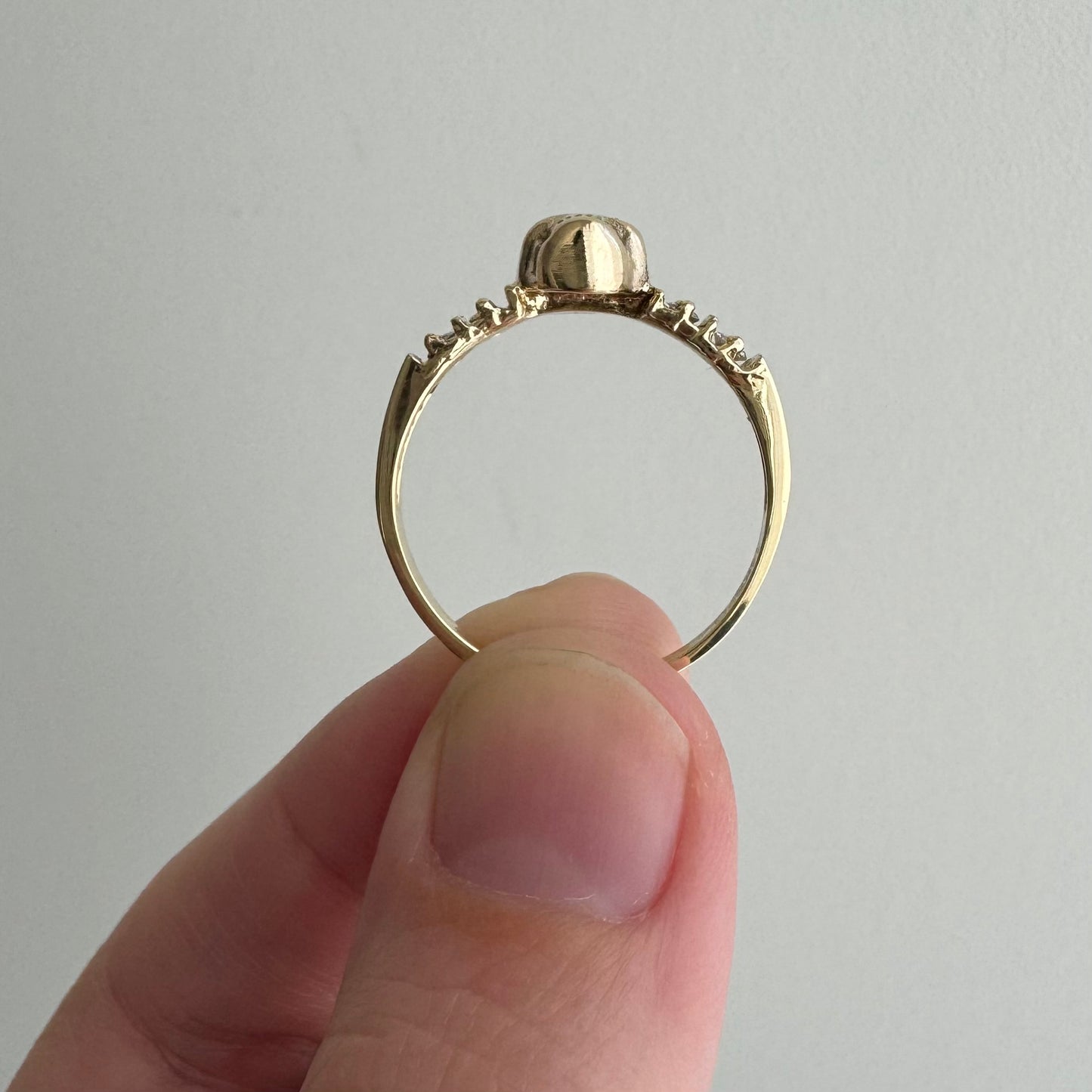 reimagined E S T A T E // memento mori / 14k and diamond half eternity skull stacking ring / size 8.25+