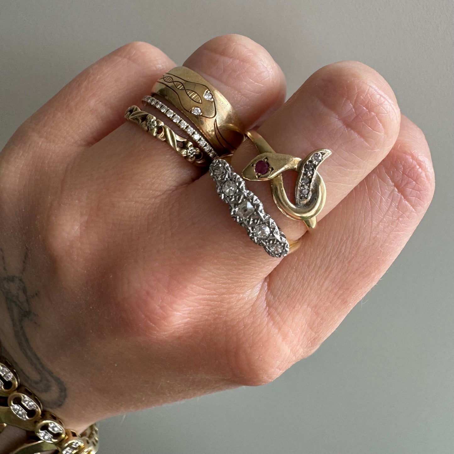 V I N T A G E // self embrace / 9k yellow gold love knot snake ring with diamonds and ruby / size 7.25 to 7.5