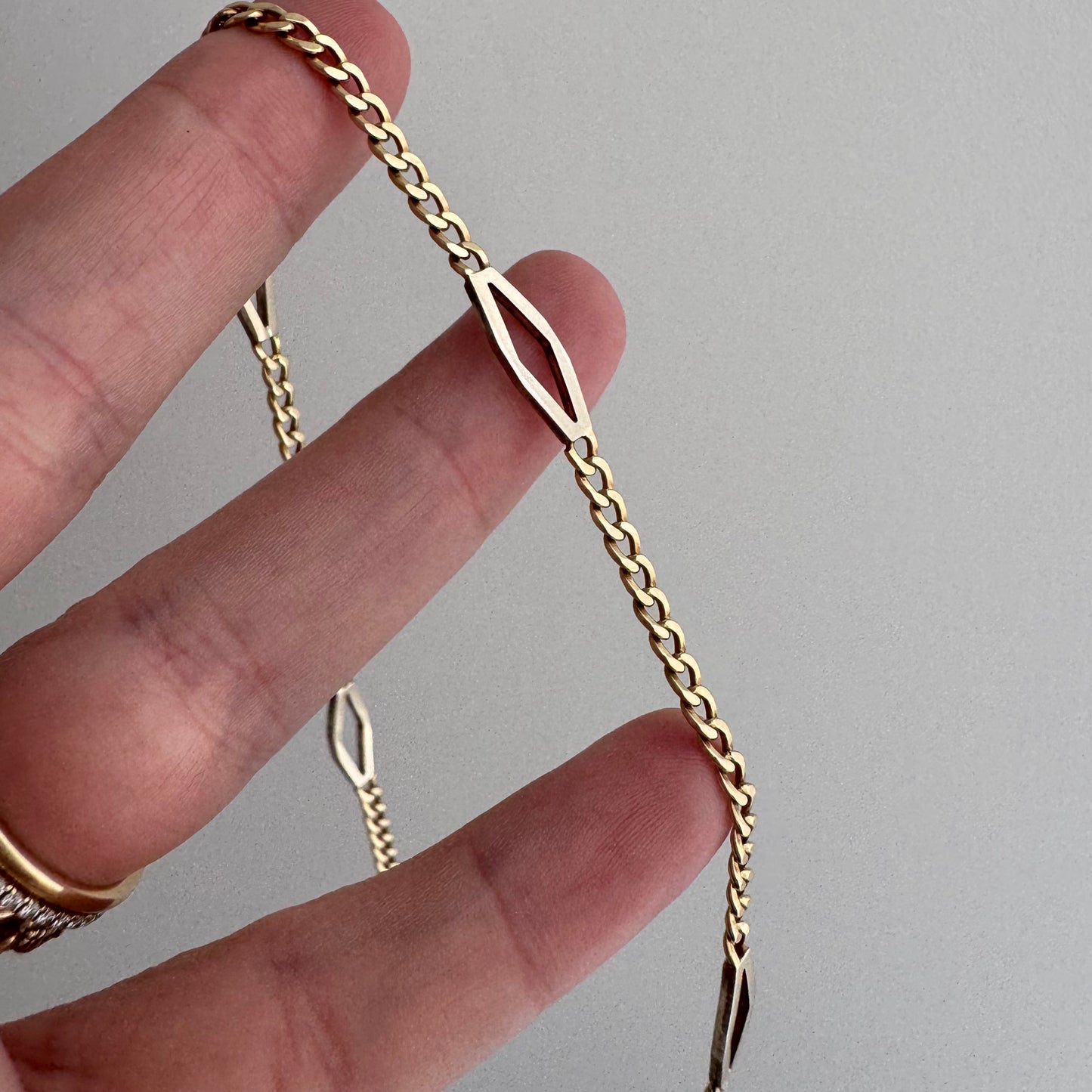 V I N T A G E // sassy curb / 14k yellow gold flat curb link with diamond shape stations / bracelet or anklet / just over 9.5", 6.6g