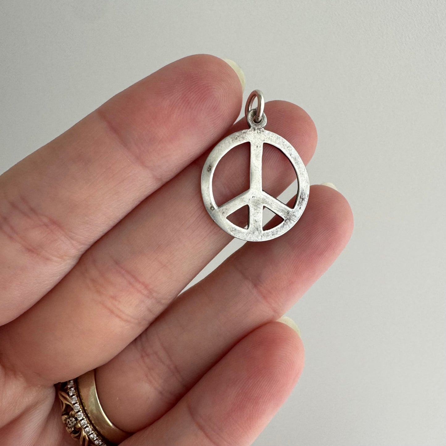 V I N T A G E // battered peace / sterling silver peace sign / a pendant