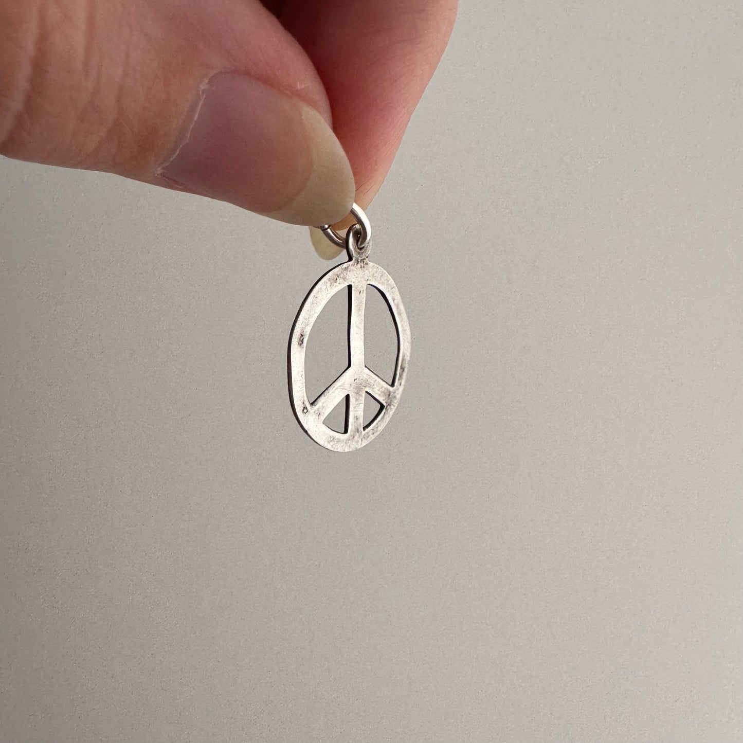 V I N T A G E // battered peace / sterling silver peace sign / a pendant