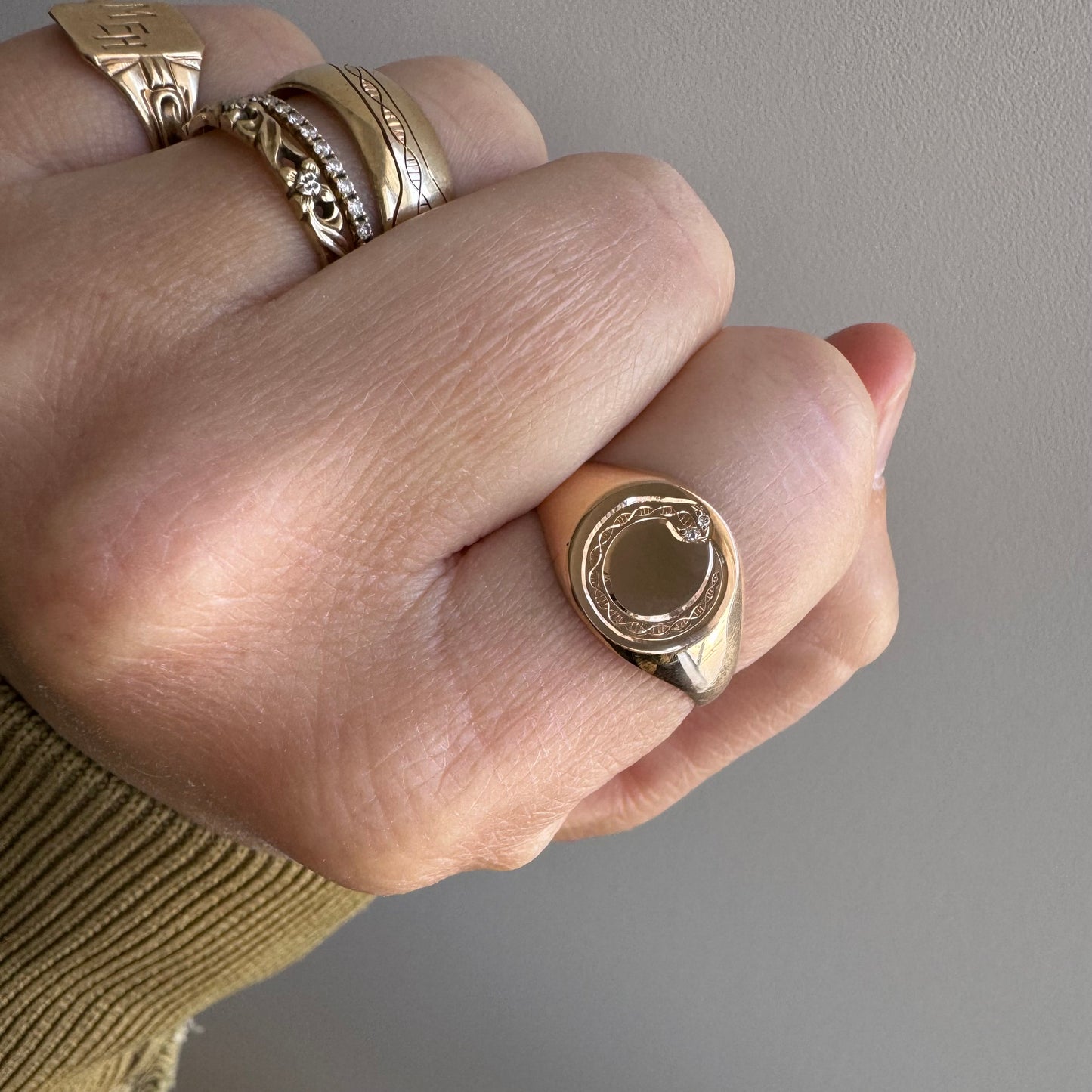 reimagined A N T I Q U E // ouroboros cycle / 10k rosy gold round signet with engraved snake and diamonds / size 9.25 to 9.5