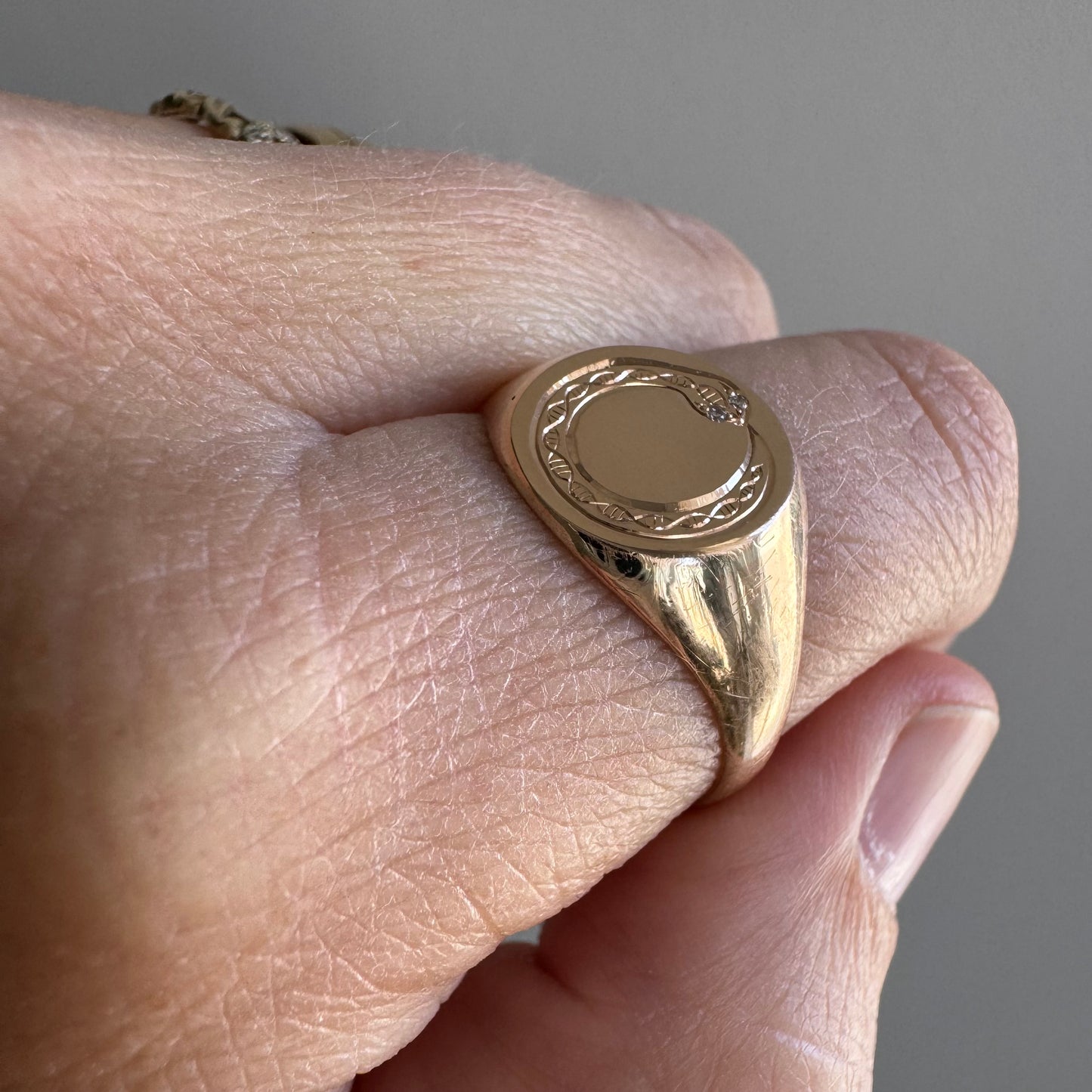 reimagined A N T I Q U E // ouroboros cycle / 10k rosy gold round signet with engraved snake and diamonds / size 9.25 to 9.5