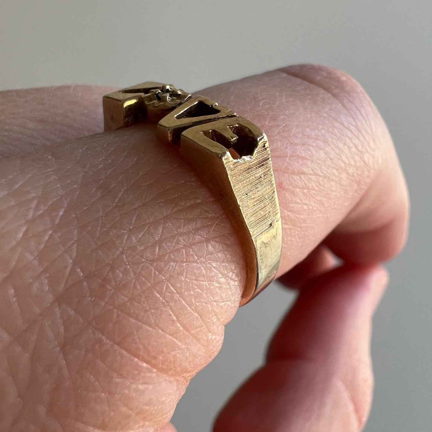 V I N T A G E // 1970s love / 10k yellow gold and diamond LOVE ring / size 6.25