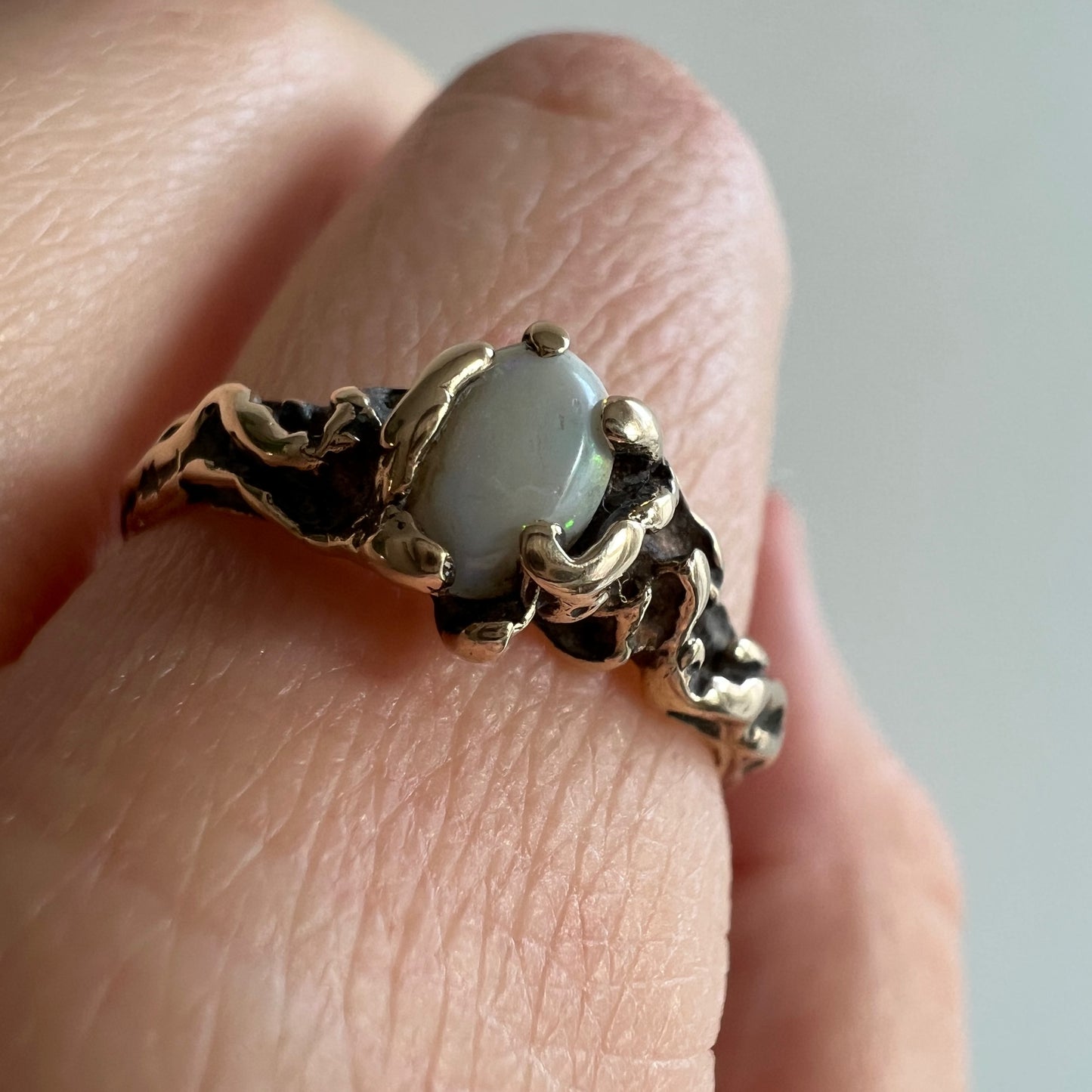 V I N T A G E // barely brutal / 14k yellow gold featuring an opal solitaire / size 7.25 to 7.5