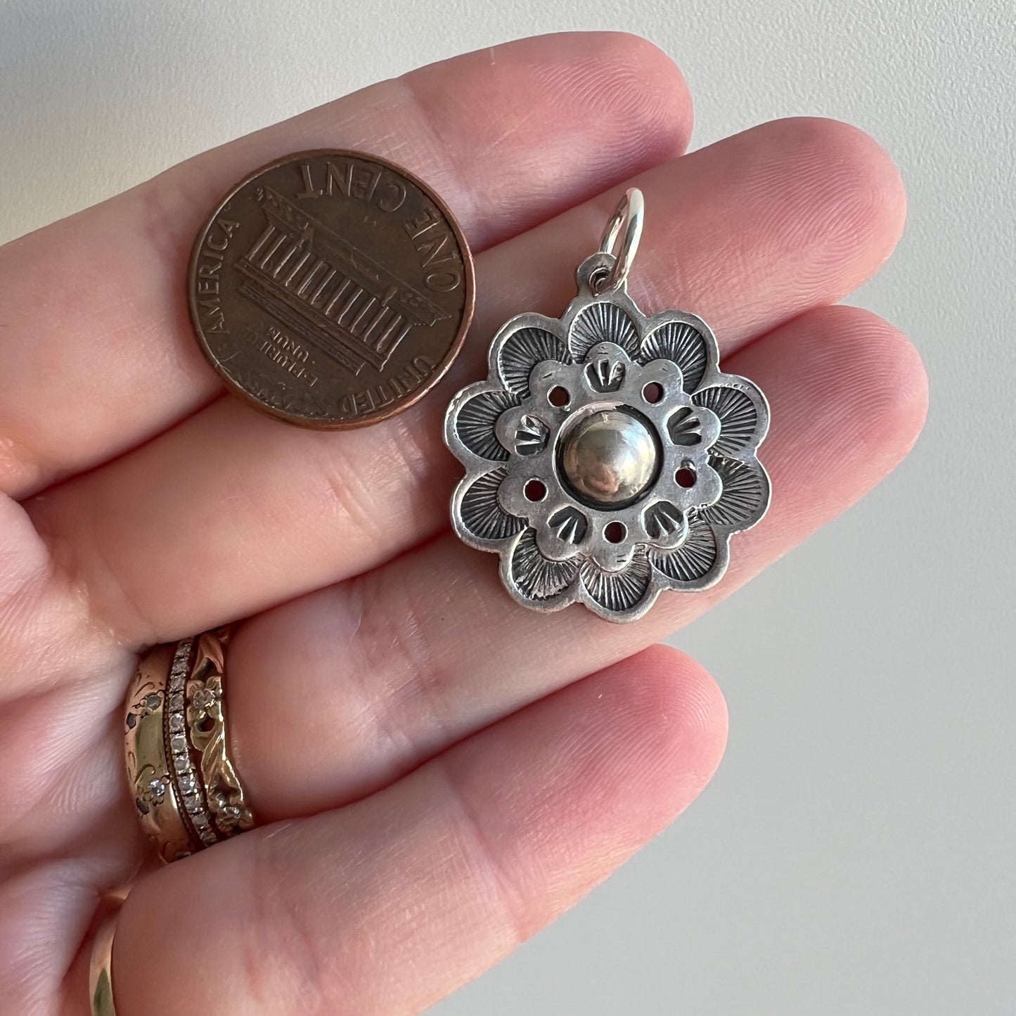 V I N T A G E // endless bloom / sterling silver stamped flower pendant